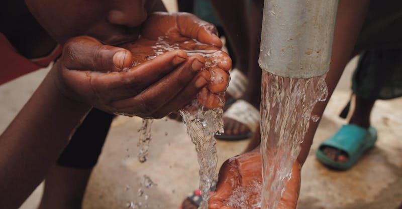 Person drinking water - staying hydrated